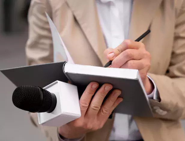 female-journalist-taking-notes